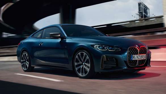 Diferencial deportivo M BMW M440i xDrive Coupé G22 2020 BMW M440i xDrive Coupé G22 2020 con diferencial deportivo M Arctic Race Blue metalizado Vista de tres cuartos del lateral